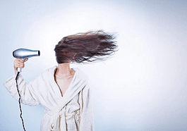 woman with blowdryer