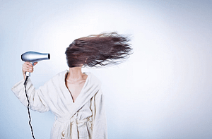 woman with blowdryer